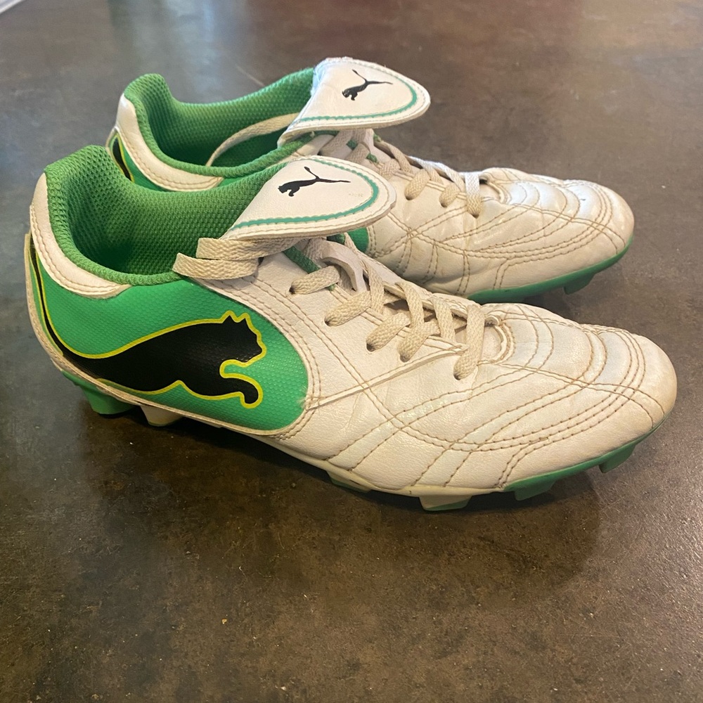 Kids Puma soccer cleats.